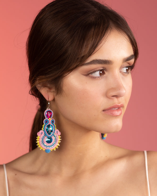 Handmade Jewelry, unique jewelry designs, Colorful Luxury designs, Pink, Blue, yellow, Purple, earrings on model
