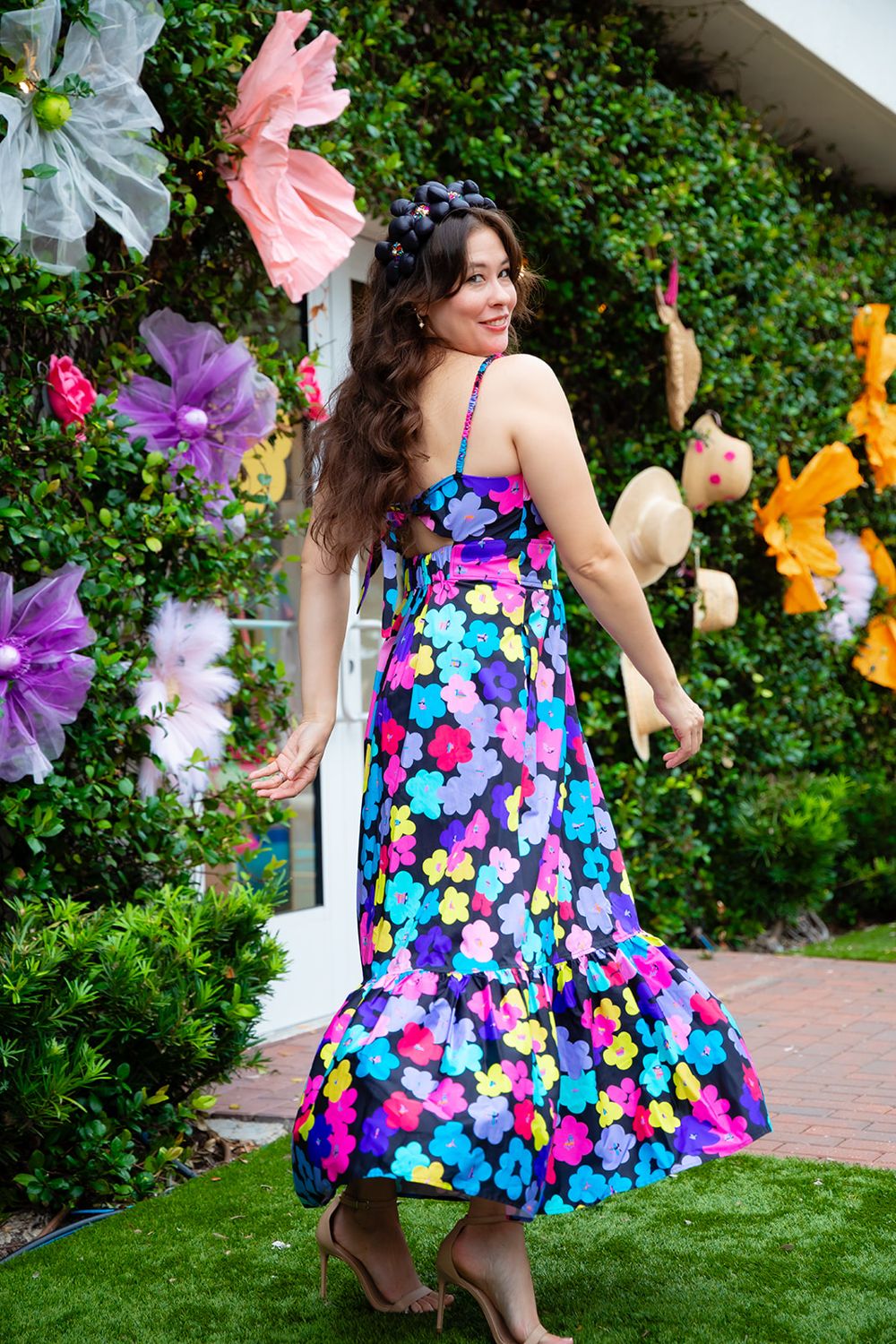 Christiana in a black floral maxi dress