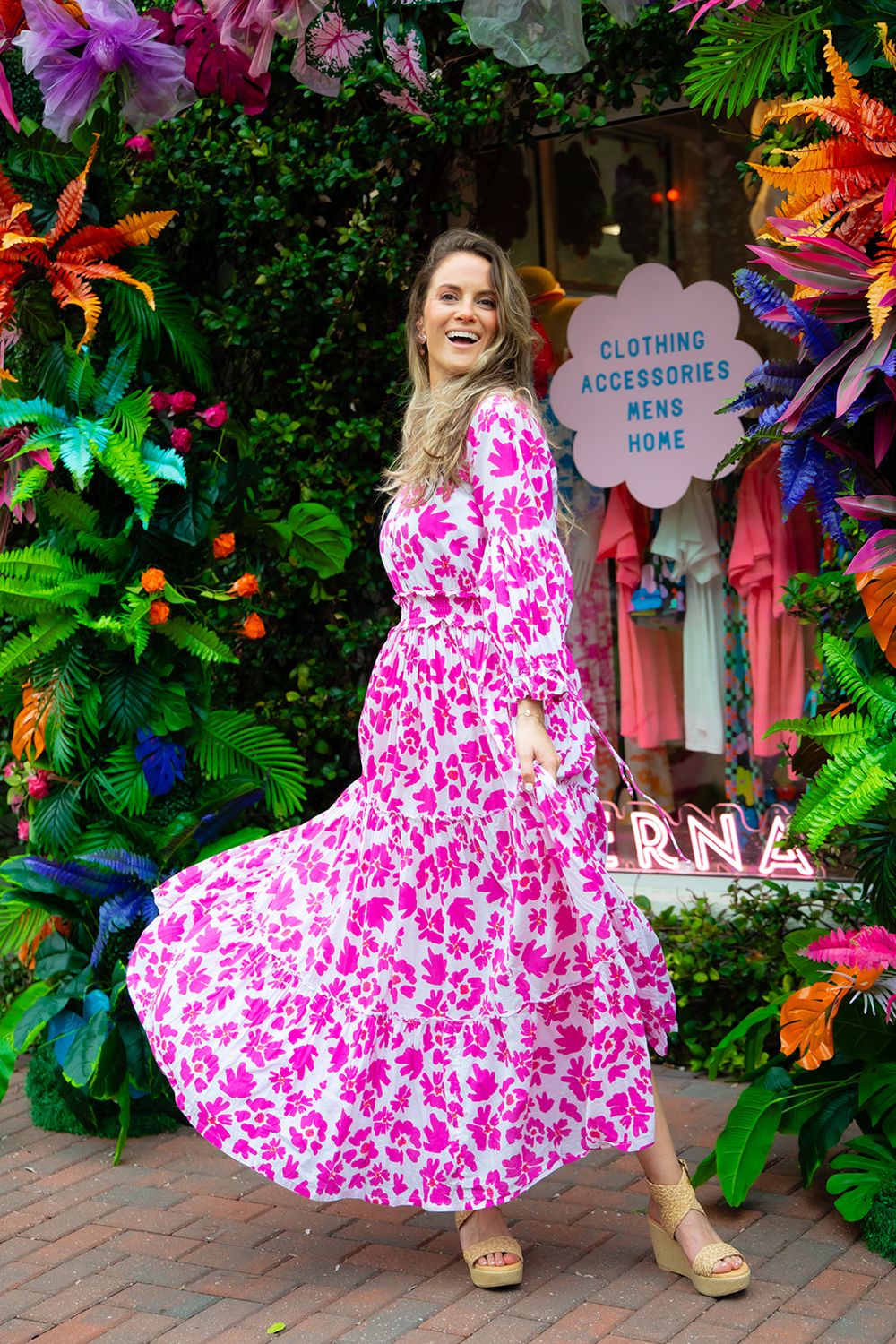 Diana in a pink floral tiered maxi dress